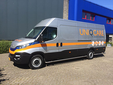 Belettering bus voor Uniqcare